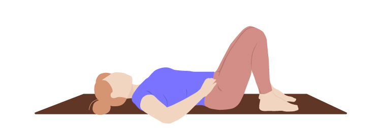 woman doing pilates pelvic tilt
